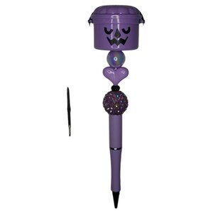 Purple "spooky pail" beaded pen with replacement ink